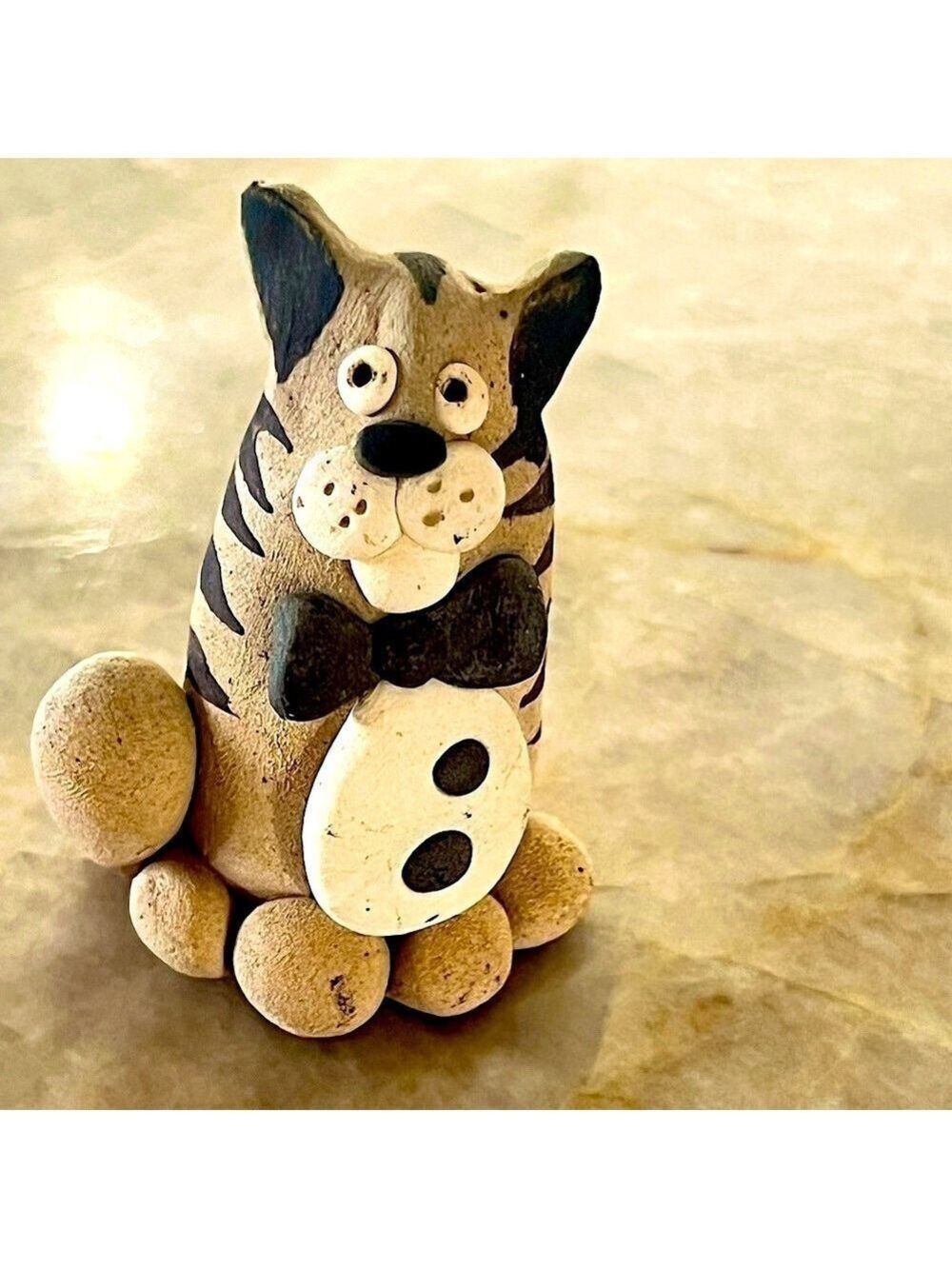 Earthenware bow tie cat figurine. Attributed to Nancy Ecklund happy creature